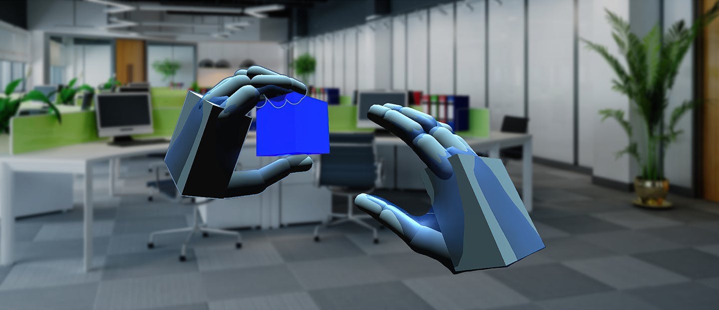 Virtual hands holding 3D model of a cube.